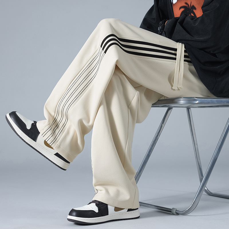 Pantalones deportivos a rayas estadounidenses para hombres y mujeres 2024 pantalones casuales rectos de cintura alta cuerdas sueltas pantalones al por mayor