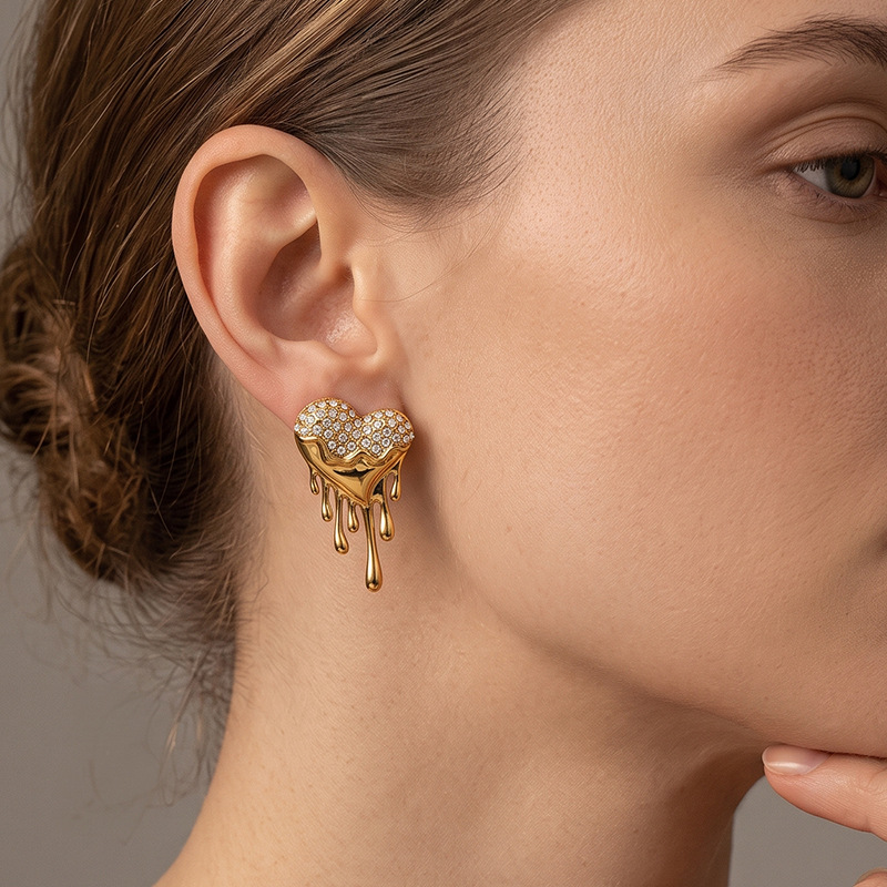 Tina transfronteriza europa y americana pendientes de acero inoxidable exagerado ligero lujo de alta sensación larga amor líquido pendientes de diamantes para mujeres