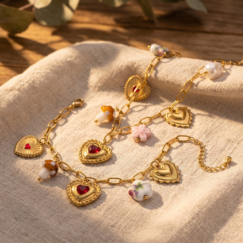 Tina Europa y los Estados Unidos transfronterizos nuevos collares de acero de titanio de amor universal lujo ligero de alta calidad cerámica flor corazón de桃 cadena clavícula mujer