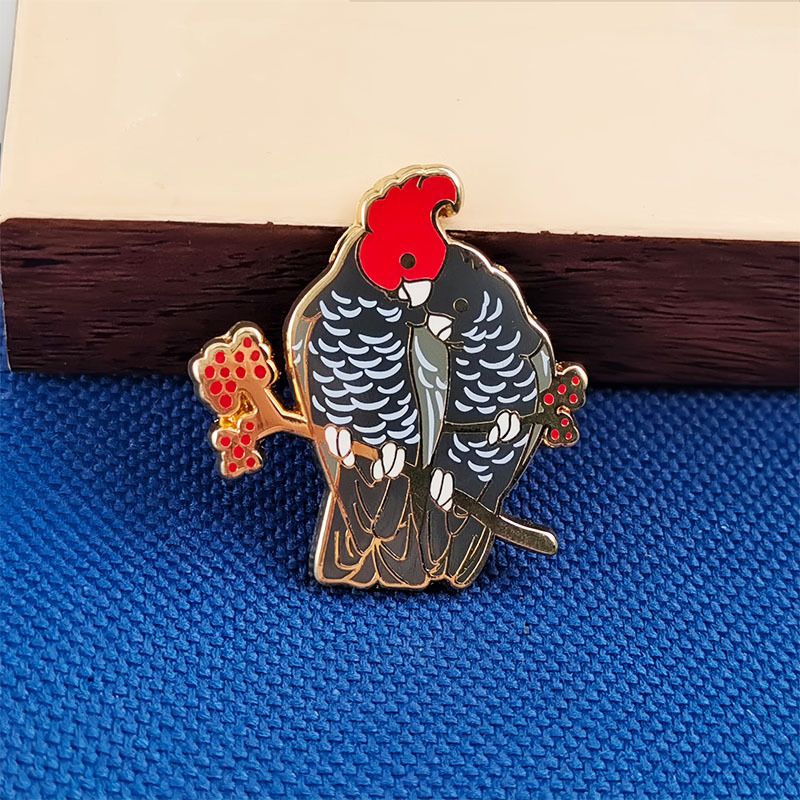Australian Red-Crowned Black Cockatoo Enamel Badge Perched on Red Berries Brooch Cultural Creative Metal Brooch Accessory