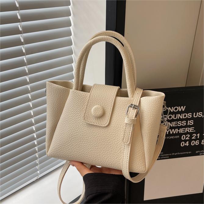 Nicho Zhong bolso de mano simple 2024 nuevo bolso de mujer super caliente bolso de balde de agua casual versátil bolso de tendencia explosiva bolso de mochila