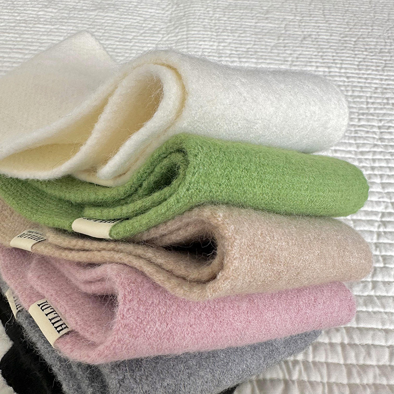 Bufanda pequeña de lana de punto para mujer Otoño e Invierno estilo coreano versátil protección del cuello perezoso perforado toalla del oído bufanda caliente del estudiante