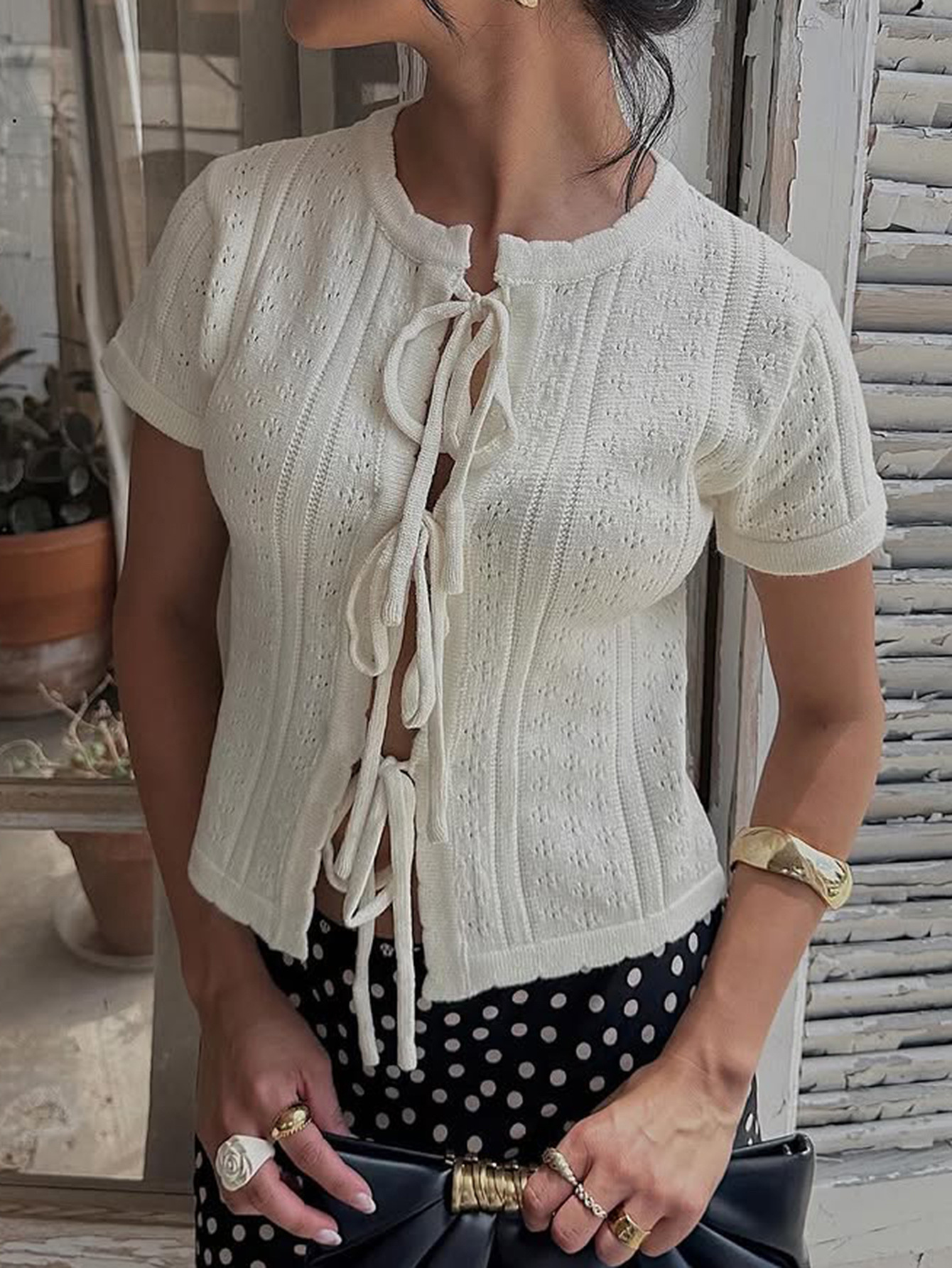 Kaikuo2026 primavera y verano transfronterizos de Europa y América ropa de mujer suave viento agujerado cardigan de lana correa casual camisa de manga corta
