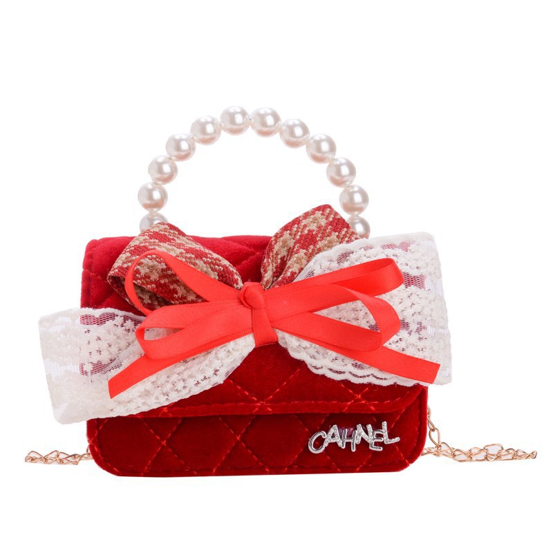 Bolso de niños nuevo bolso de perla rojo de Año Nuevo lindos princesas niñas bolso de hombro de cadena de estilo extranjero bolso de mochila