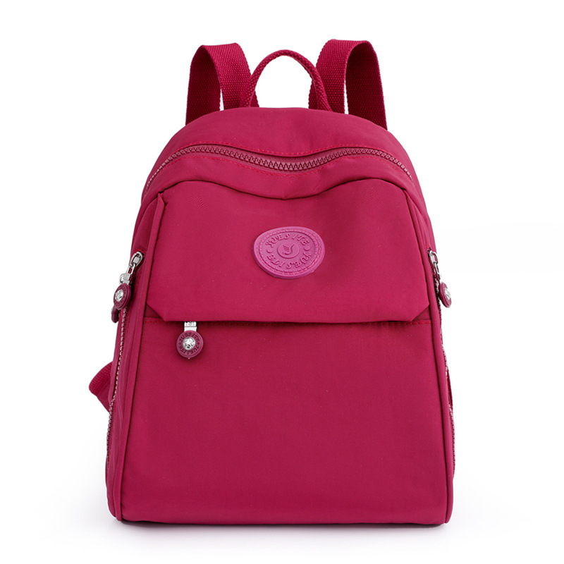 Mochila para mujer, mochila pequeña de tela Oxford de gran capacidad, resistente al agua, nueva mochila escolar de nailon lavanda de todo fósforo de moda