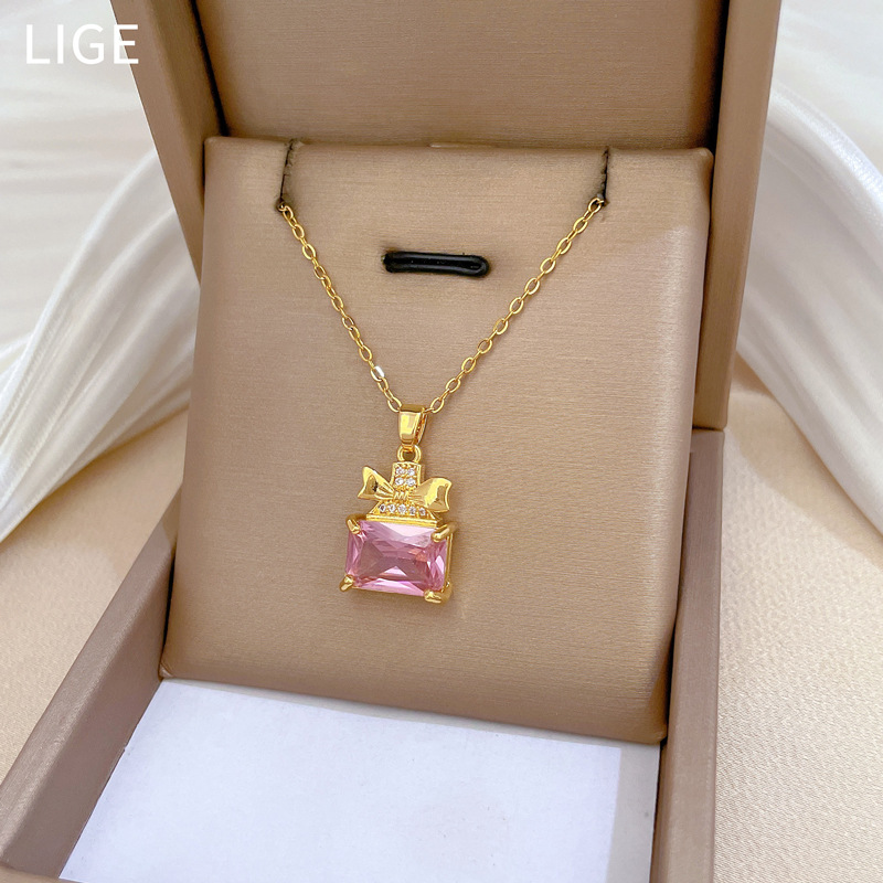 Set collana e orecchini a farfalla con boccetta di profumo_voghion.com