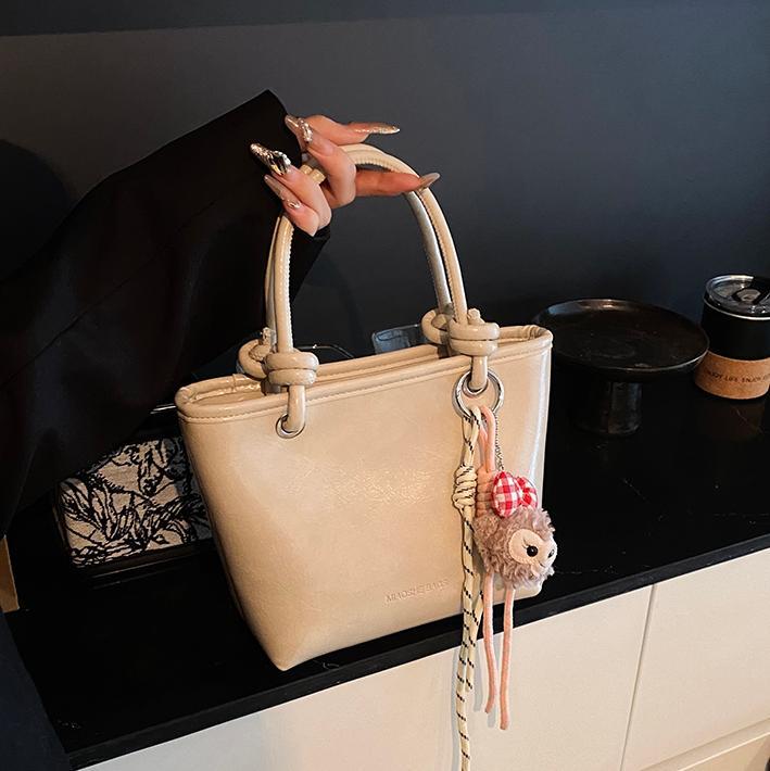 Bolso popular de este año para mujeres 2024 nueva moda versátil bolso de cubo de moda extranjera bolso de hombro portátil