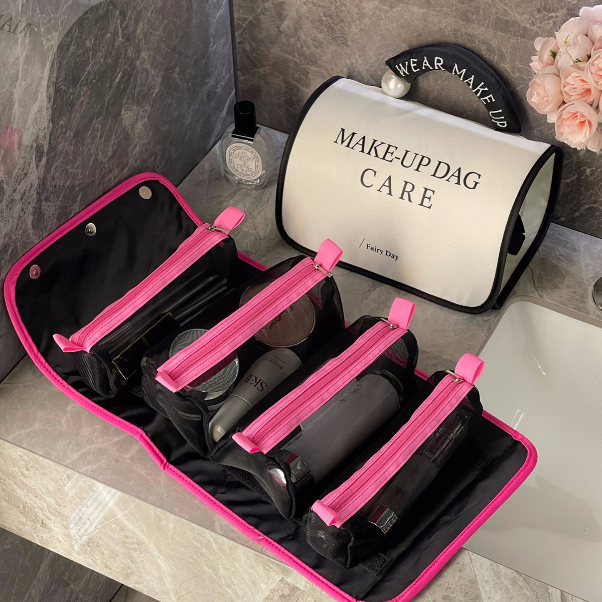 2024 nuevo bolso de lavado de perlas cuatro en uno portátil de gran capacidad alta sensación plegable bolsa de maquillaje para productos de cuidado de la piel de viaje