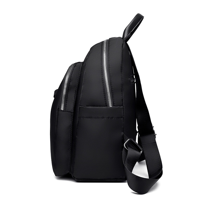 2024 nueva mochila pequeña Oxford casual para mujer simple y versátil bolso de madre ligero al aire libre mochila al por mayor