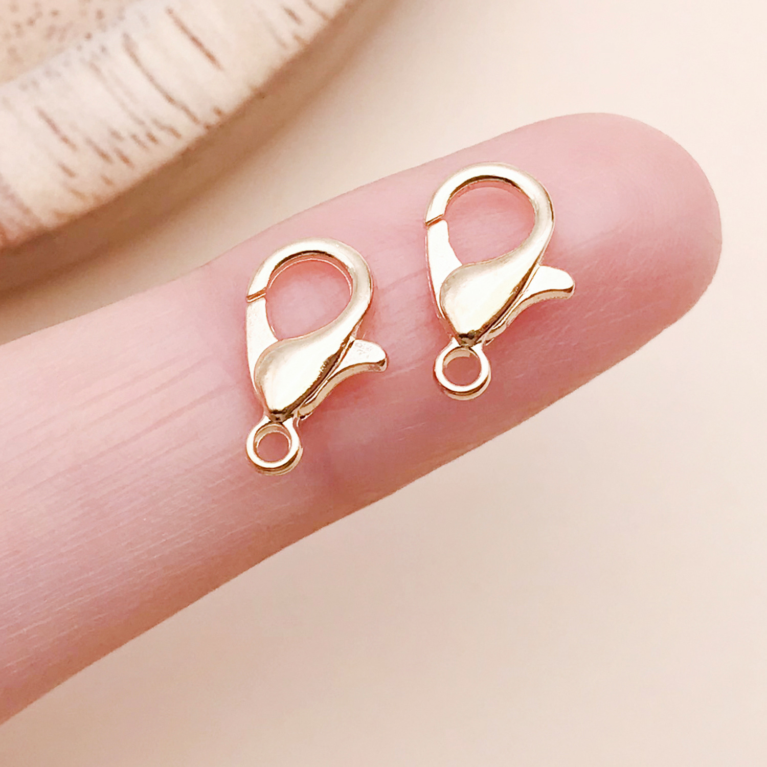 9285-YJ-KC金302龙虾扣7x12mm-锌合金