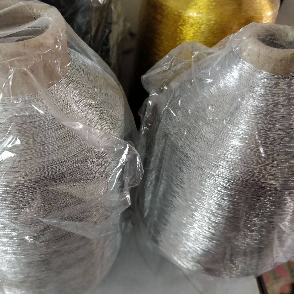 透明镭射AB彩珠光片包芯线包棉纱芯纬纱金膜包芯机车缝制线