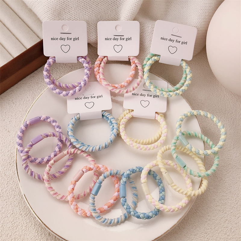 A principios de la primavera nueva cuerda de cabeza de color caramelo anillo de cabello coreano de niña de alta elasticidad universal cola de caballo cuerda de cabello adornamiento para el cabello