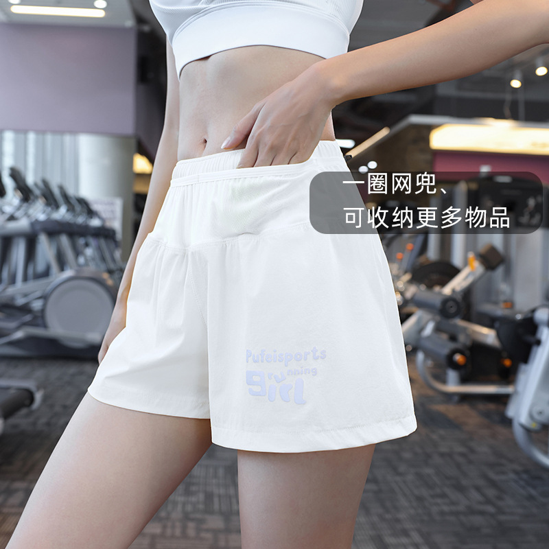 Fábrica de fuerza de tenis femenino forrado falso dos piezas de bádminton yoga deportivo rápido secado acondicionamiento físico pantalones de mujer