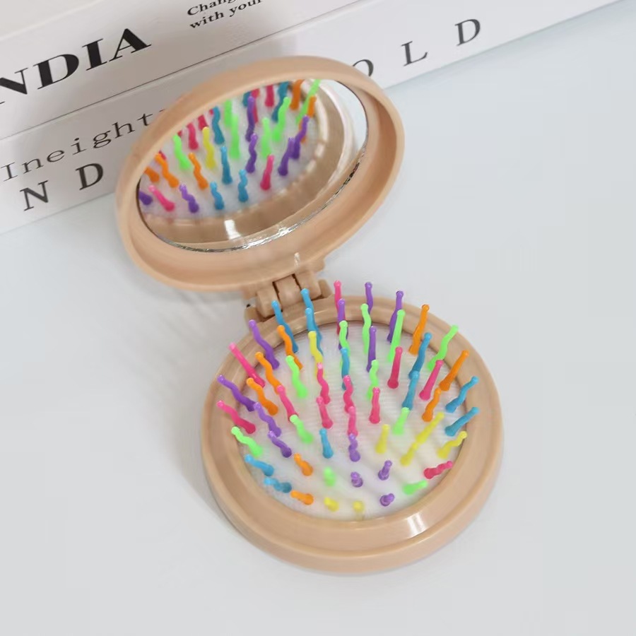 Airbag plegable Pequeño peine con espejo de maquillaje DIY adorable cojín de aire de niña cabeza de masaje portátil peine espejo todo en uno