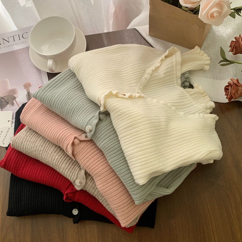 Han dan ~ soft waxy xiangfeng wood ear V-neck sweater women's autumn Joker short slim irregular base shirt