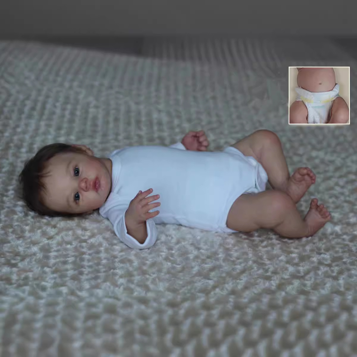 Muñeca suave de nacimiento familiar muñeca pesada de simulación de niños CM regalo de cumpleaños transfronterizo 45 bebés de venta caliente