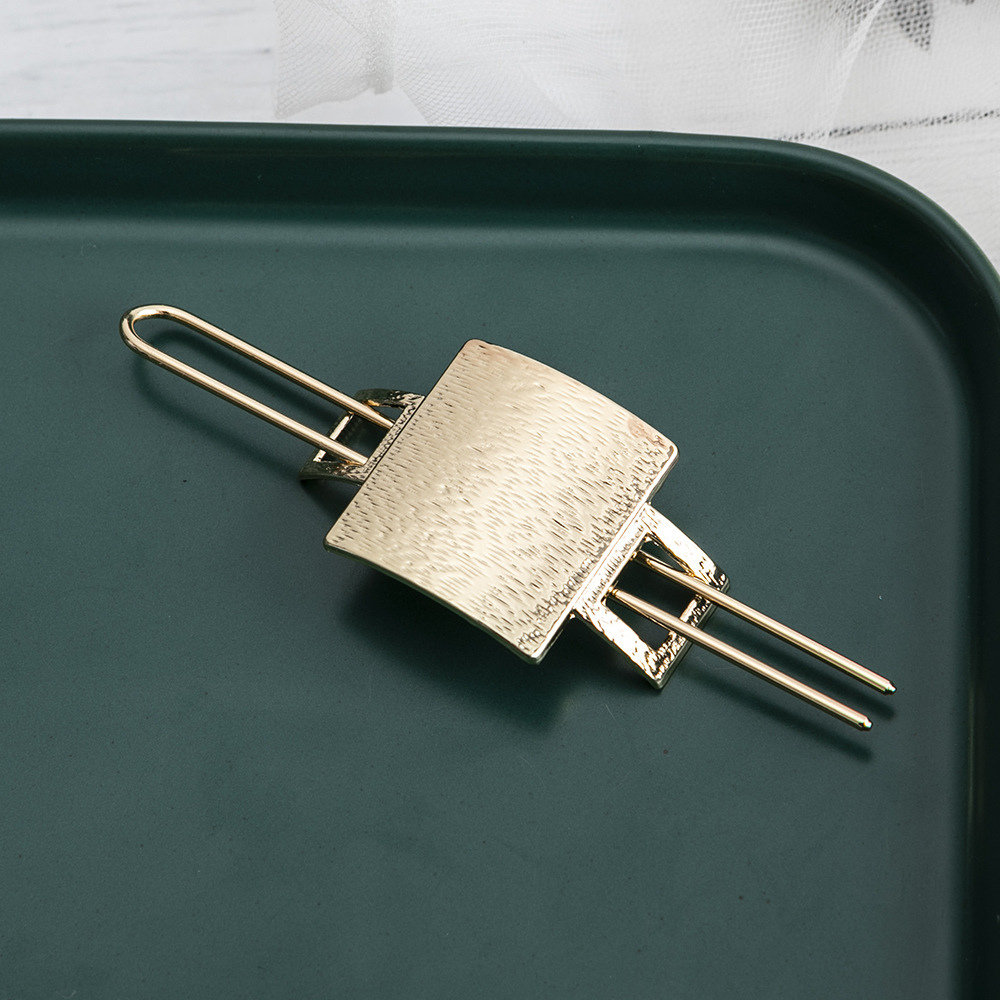 Estilo coreano aleación clip tocado exquisita horquilla de metal europeo y americano simple flecha perla horquilla rizador de pelo