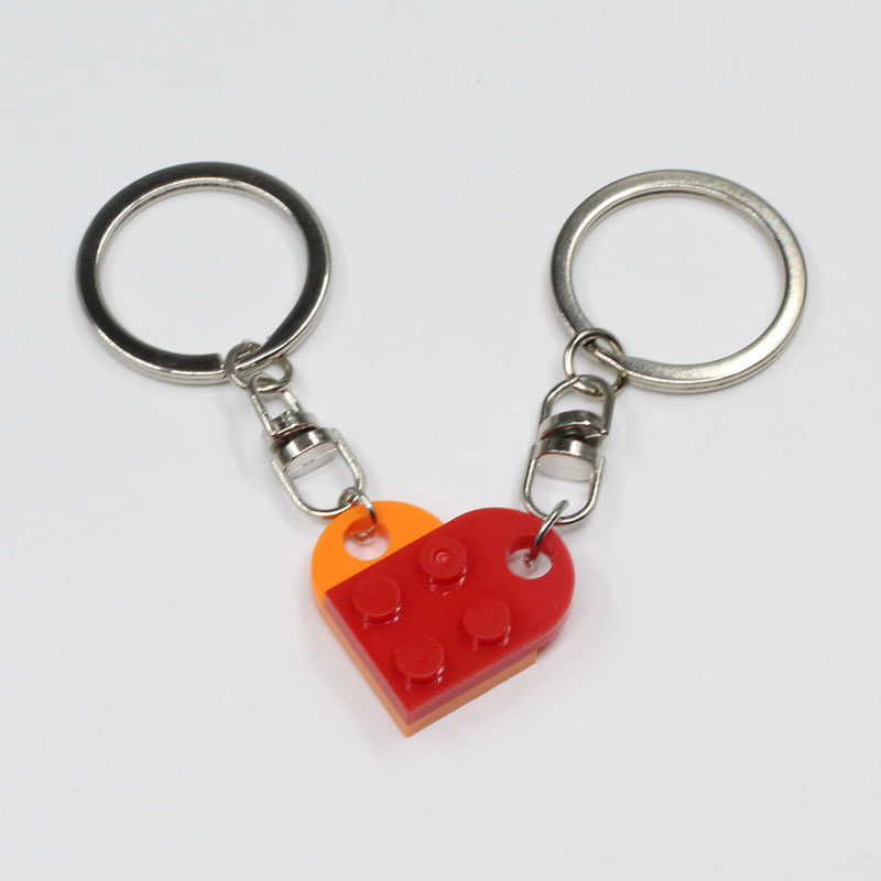 Europa y América Nueva spliced dividir bloques de construcción pareja amor llavero Comercio electrónico transfronterizo Lego rompecabezas llavero