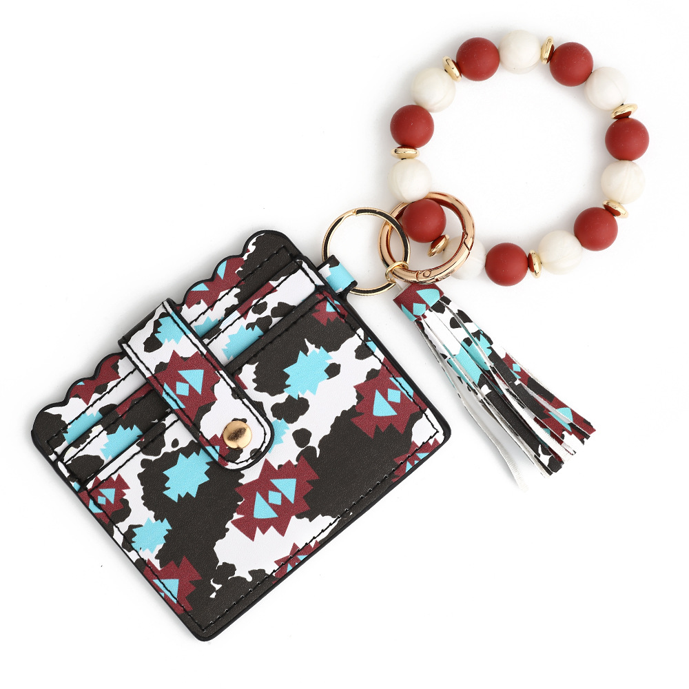 Casual Ethnic Style Sunflower Solid Color Leopard Pu Leather Beaded Tassel Keychain display picture 8