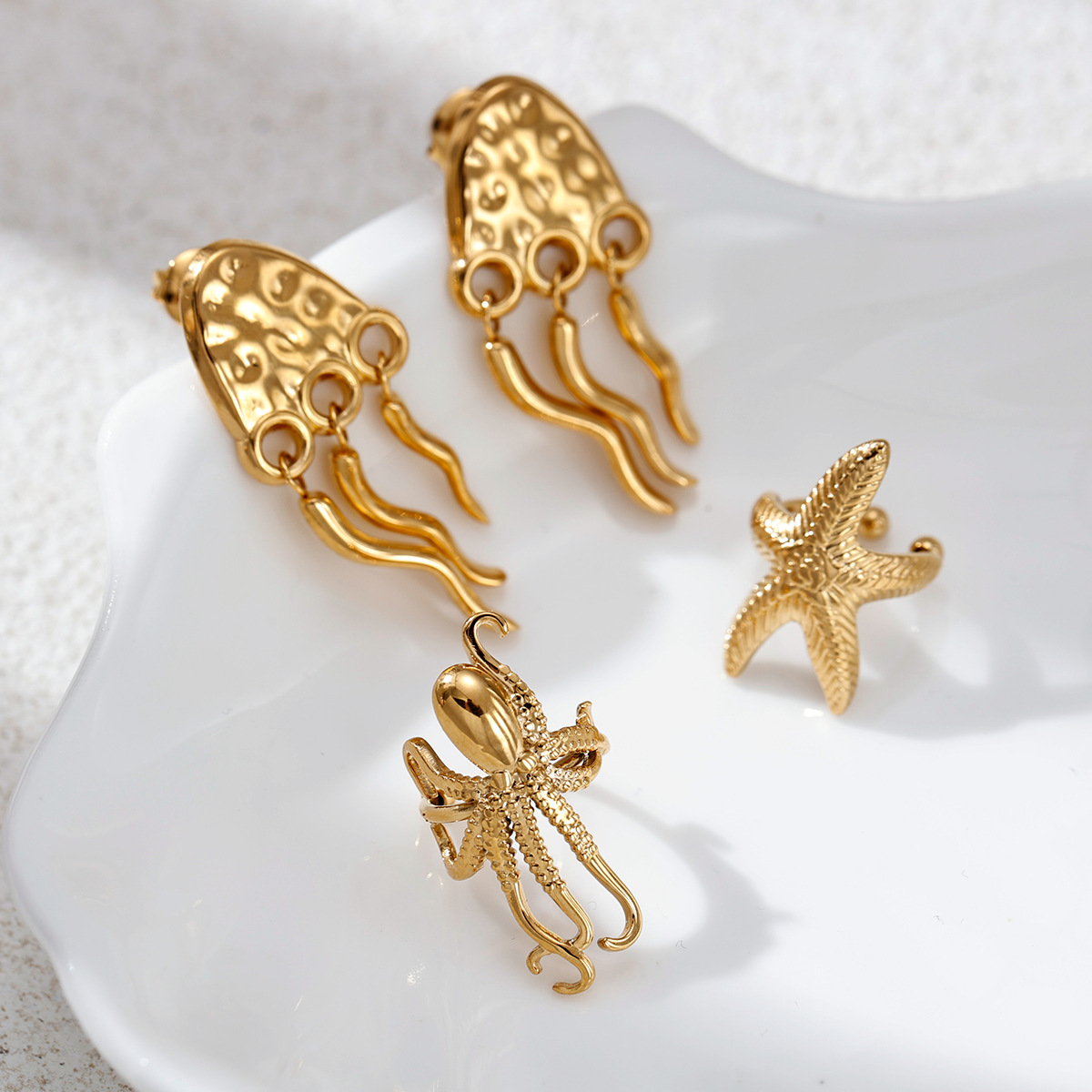 Taina Europa y los Estados Unidos pernos de acero inoxidable para mujeres no se desvanecen, pulpo marino pernos de estrellas de mar lujosos nichos de venta caliente transfronteriza