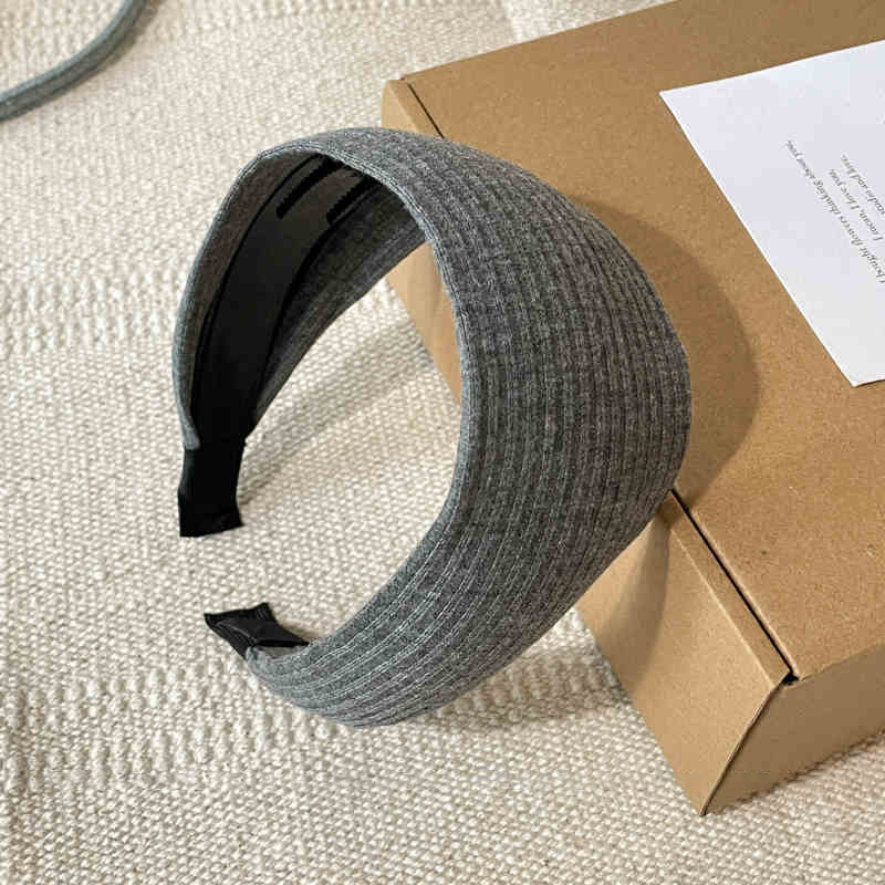 Otoño y invierno de alta sensibilidad para el cabello de mujeres cráneo alto borde amplio agujero de punto de banda de cabeza muestra cara pequeña gris ensanchada banda de cabello