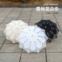 拍摄木质蕾丝白色工艺伞