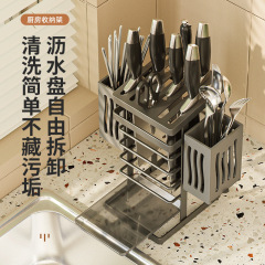 台所の穴を開けないナイフホルダーのテーブルには、水切り付きの棚があります。多機能壁掛け式箸筒スプーンの収納棚です。