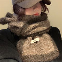 韓国系の雰囲気感のあるニットのマフラーの女性は2024年に新型の秋冬の高級感があります。