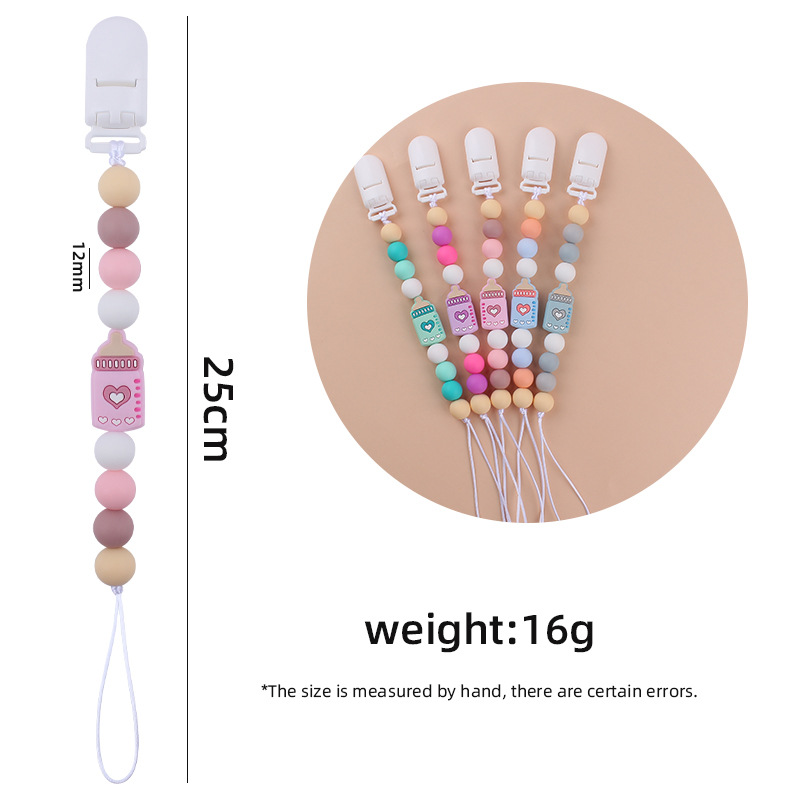 Nuevos suministros de bebé biberón de dibujos animados pequeño mordedor calmante bebé DIY cuentas de silicona mordedura molar Cadena de pezón