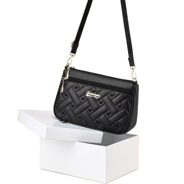 Capacious shoulder bag