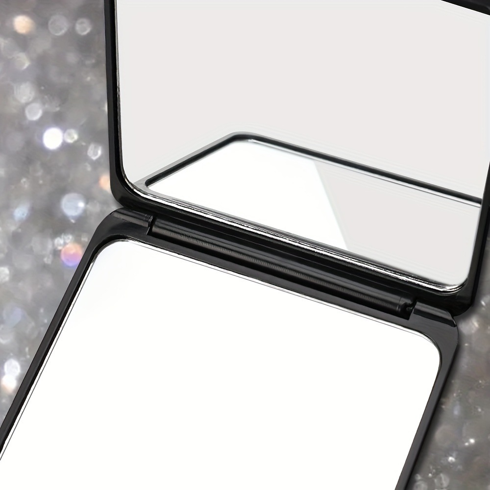 Fashionable handheld double-sided folding mirror