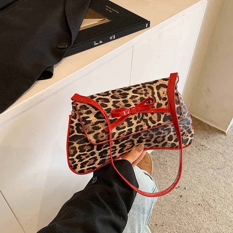 Bolso de leopardo nuevo estilo retro coreano arco de moda PU estilo exterior bolso de hombro axilar