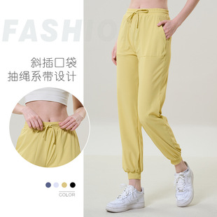 New European and American bare-feeling loose pocket yoga pants for sports running quick-drying harem pants leg-binding yoga clothes for women