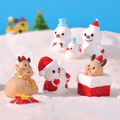 クリスマスの置物の小さい景観の装飾の小さい置物のクリスマスの贈り物の雪だるまの老人のヘラジカの樹脂の工芸品の部品