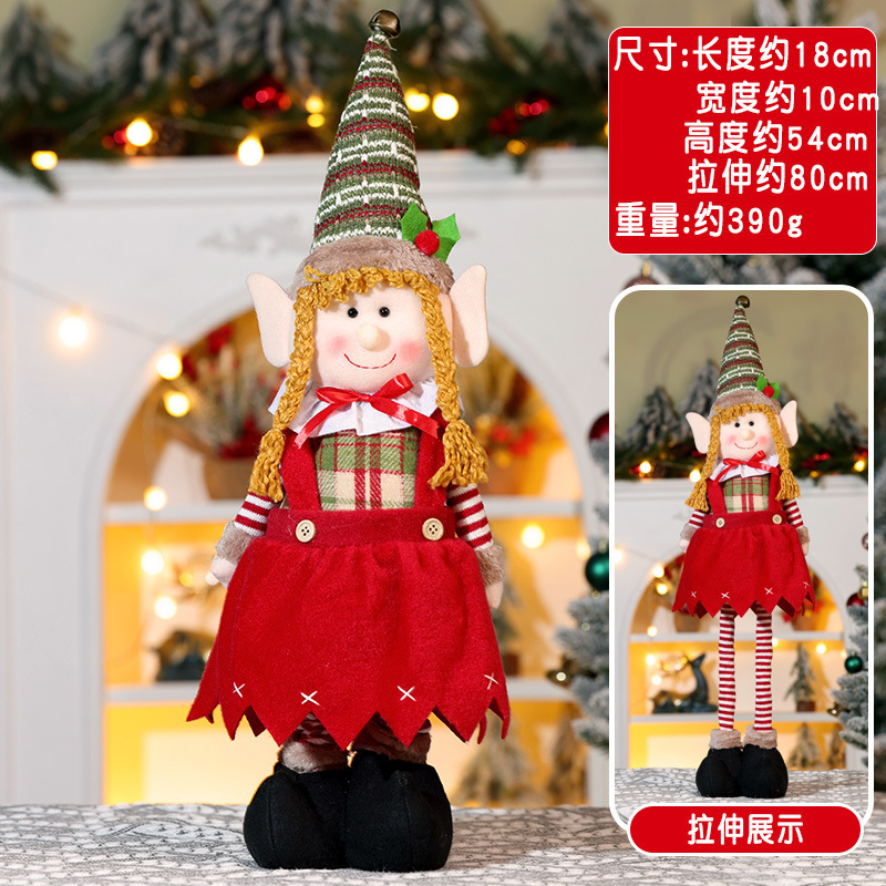 国境を越えた新製品クリスマス伸縮公仔装飾品クリスマス長脚精霊人形が男の子の女の子の人形を飾っている|undefined