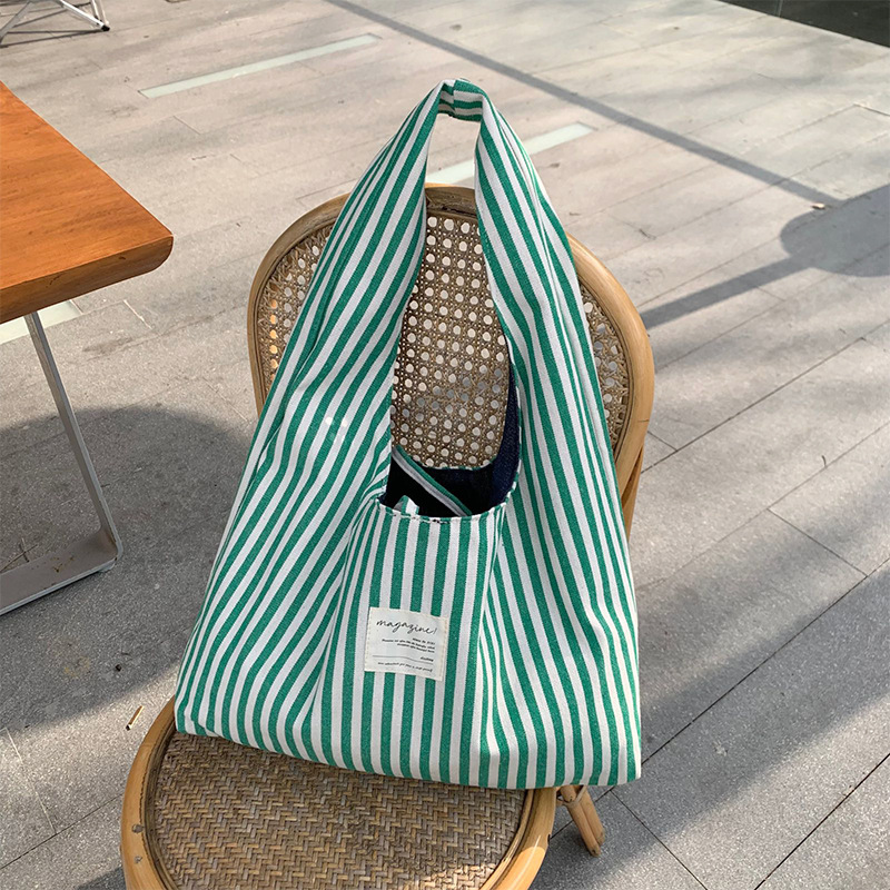 Green vertical striped double-sided vest bag (random color cycle)