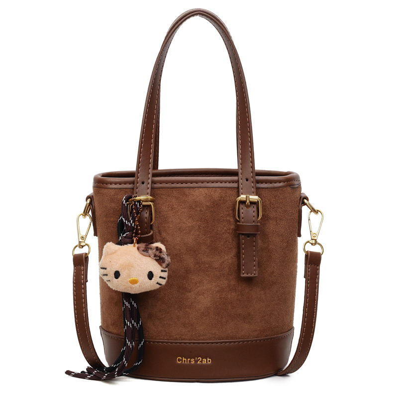 Cross-border coreano nicho esmerizado bolso de cubo de mano mujer 2025 nuevo invierno retro mochila de hombro mochila de viaje