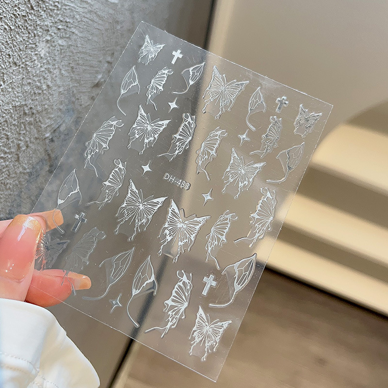 液体の蝶のネイルシールの立体レーザーと金銀の白黒の蝶の薄い靭性帯のゴムを背負って花の爪を貼って卸売りを貼ります。|undefined