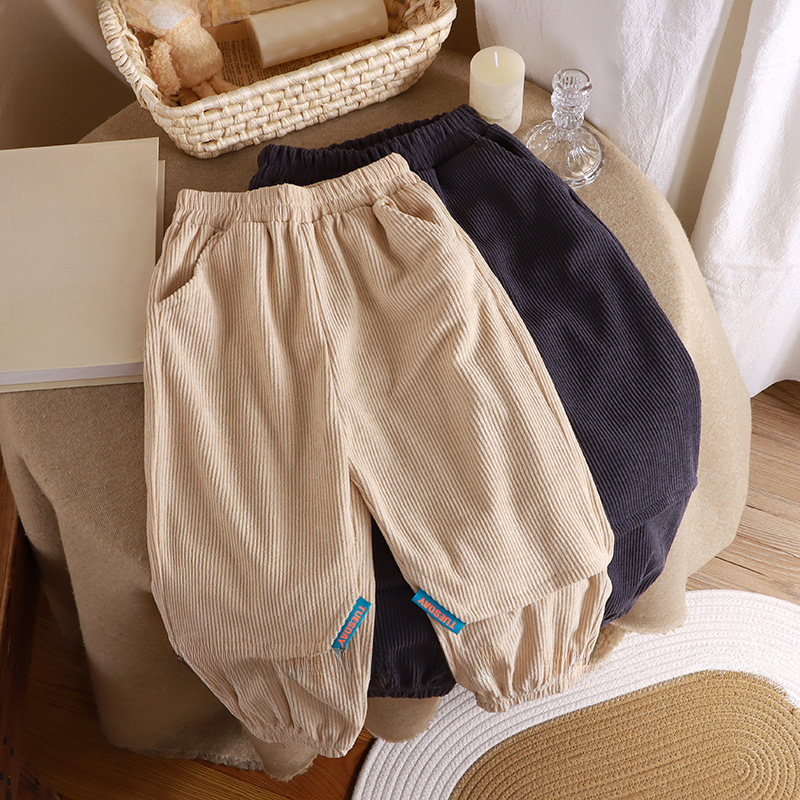 New autumn and winter thickened one-piece velvet warm pants children's loose cuffs plain corduroy long pants children's clothing wholesale 