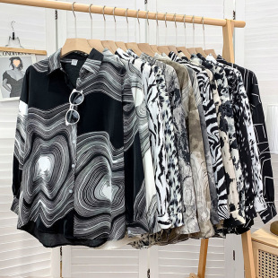 Cold wind loose ink leopard printed long -sleeved shirt female autumn temperament design sense niche outer stack wearing top