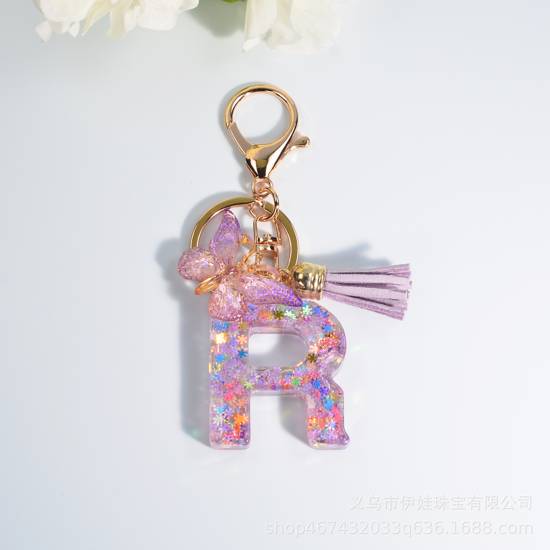 Nuevo copo de nieve carta resina epoxi carta llavero bolso la manera las mujeres 26 inglés borla mariposa colgante