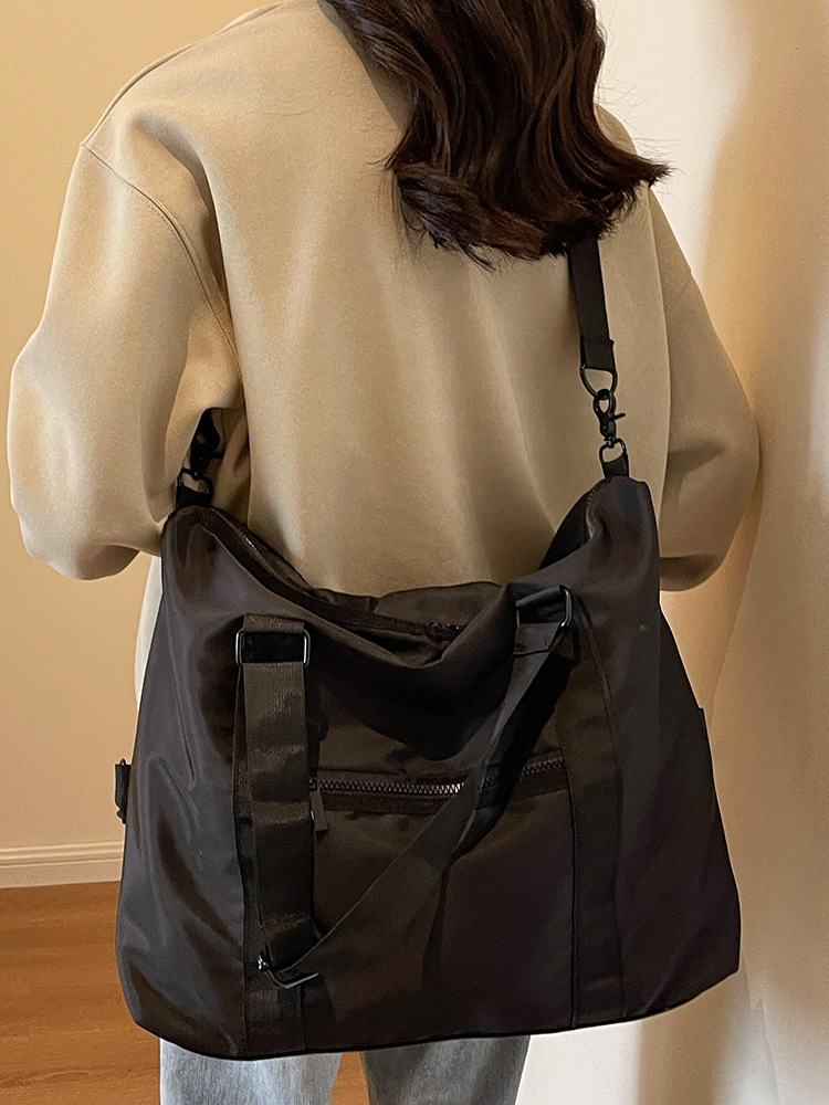 Bolsa de viaje de corta distancia bolsa de equipaje ligero de gran capacidad de los hombres de encargo al por mayor de color sólido bolso de hombro portátil