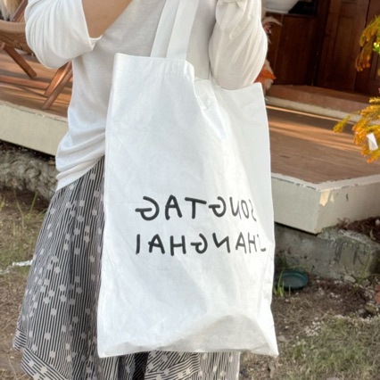 简约白色ins杜邦手提袋复合pu防水松弛感帆布袋包购物袋