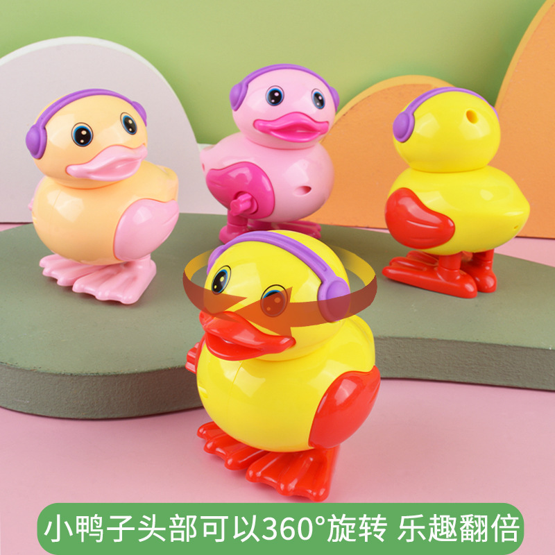 Bobinado pequeño pato reloj pequeño pato puesto buena oferta precio al por mayor pato saltando juguetes para niños al por mayor
