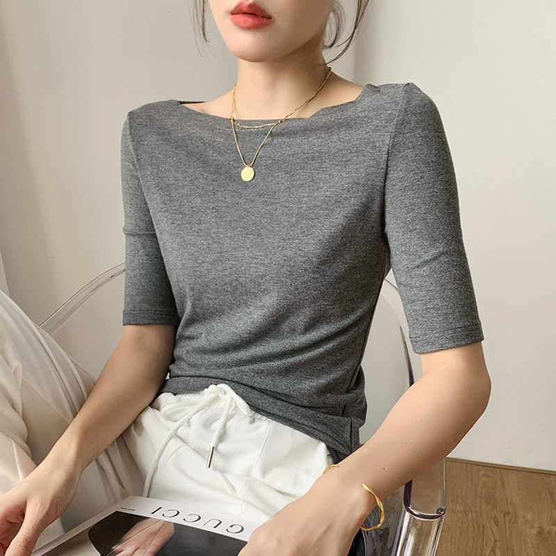 中袖の洋風のモーダルの肩の上着の女性の春夏の薄い金の中で5分の袖のtシャツを掛けて合わせて底のシャツの女性を詰めます。|undefined