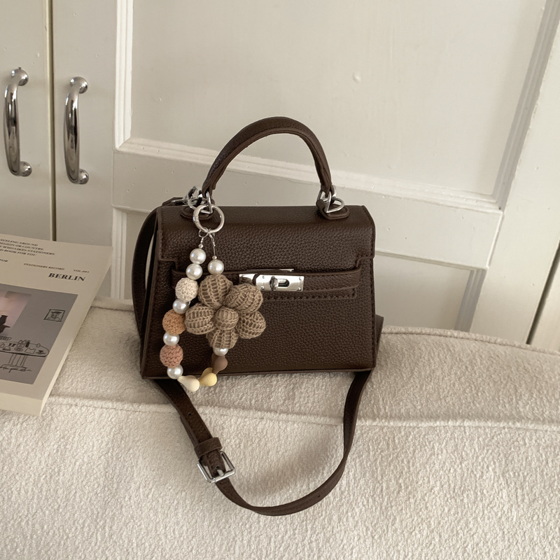 Bolso de mano de alta sensación para mujeres 2026 nuevo retro lichi Kelly bolso nicho lujoso mochila de hombro image 10