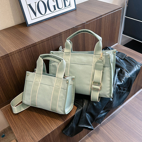 Japanese and Korean foreign trade canvas bags for women 2024 new trendy fashion handbags niche contrasting color commuter shoulder crossbody bag