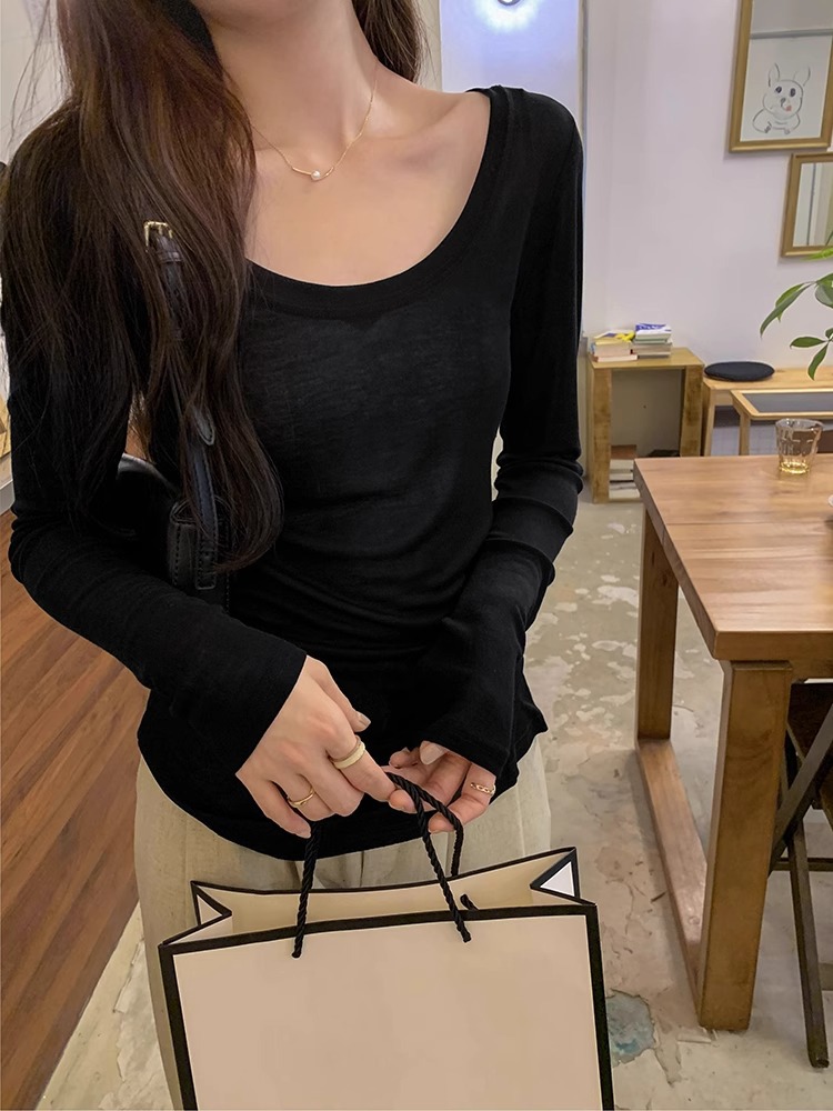 テンセル肌に優しい白ローラウンドネックボトリングシャツ純粋な欲望ホットガール長袖Tシャツレディース秋新作スリムインナートップ