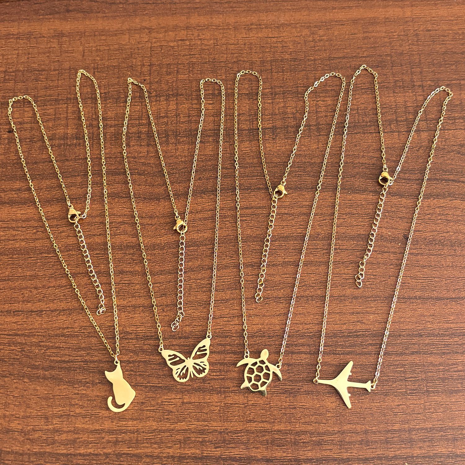 5g Weight PVD Coated Gold Plating Process Real Gold Plated Plating Material 304 Stainless Steel Pendant Material Pendant Necklace Classification 304 Stainless Steel Chain Material cable chain Chain Type 1 Piece Quantity Casual, Daily Occasion 304 Stainless Steel Material Cat, Butterfly Pattern Women's Gender Plating Design Sweet, Simple Style Style Gold, Silver Color Wholesale Jewelry Sweet Simple Style Cat Butterfly Airplane 304 Stainless Steel 18K Gold Plated Plating Pendant Necklace 无