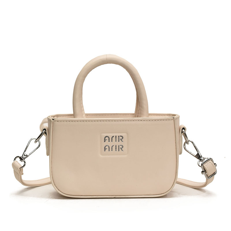 Coreana para niños y niñas bolsos pequeños, mini lindos bolsos de bebé de color sólido de moda 2025 nuevos niños bolsos de hombro